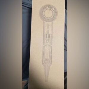 White Dyson hair dryer with five attachments.